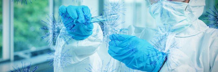 Composite image of digital image of blue coronavirus. Testing for Coronavirus pandemic