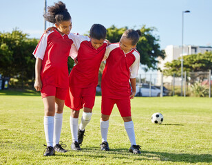 Soccer, injury and children team help, support and walk with hurt friend during game at a sports...
