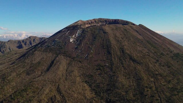 Mt Vesuvius wide aerial view orbiting sunny South Italy landscape