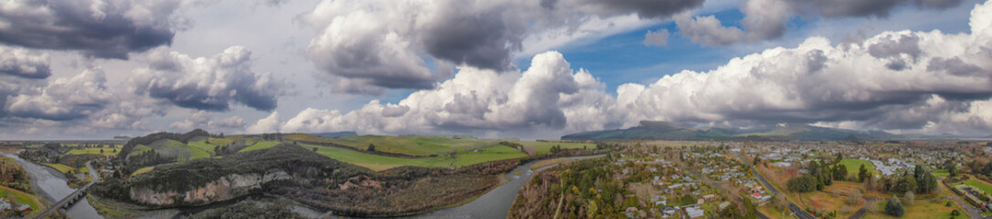 Naklejka premium Panoramic aerial view of Turangi and Lake Taupo landscape at sunset, New Zealand