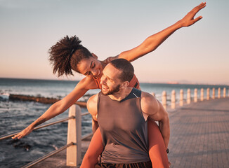 Beach, fitness and couple piggyback at sunset happy for summer holiday, vacation and quality time on weekend. Love, dating and black man and woman relax after exercise, workout and training by ocean
