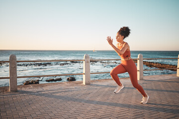 Fototapeta na wymiar Fitness, focus and woman running by the beach for training, cardio and exercise in Thailand. Mockup, sports and latino athlete runner on the promenade for a workout, start of a race or marathon