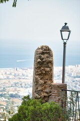 pillar looking over city