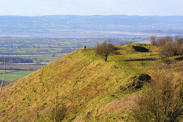 Fototapeta premium View over The Severn Vale from The Cotswold Way long distance footpath near Coaley Peak viewpoint, Cotswolds, Gloucestershire, UK