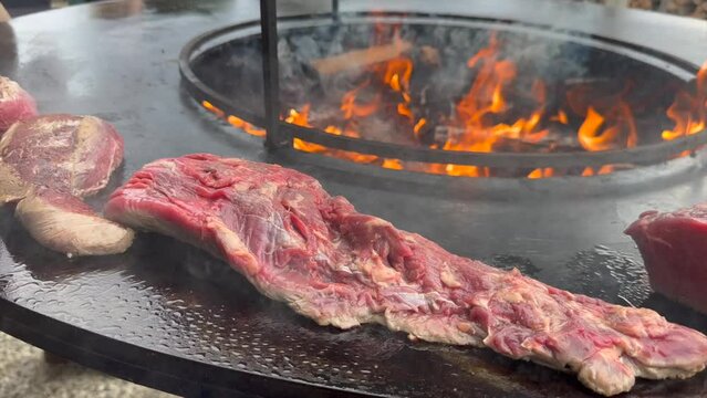 Beef filet on wood fire brasero, filet de boeuf au bras&eacute;ro