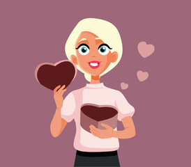 Blonde Woman Holding a Heart Shape Gift Box Vector Illustration. Pretty girlfriend receiving a Valentine’s gift from her boyfriend
