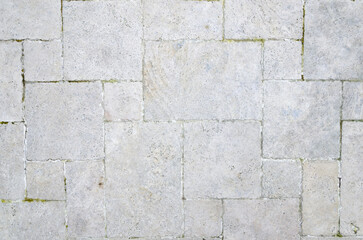 Obraz premium Grey square Stone tile floor paving fragment - Texture of old rock - Seamless texture of grey stone