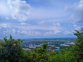 selective focus picture of mountains and clouds in the rainy season