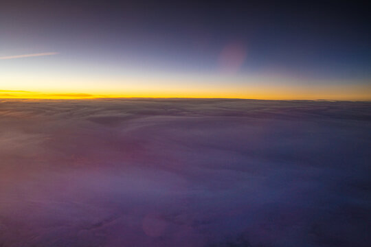 Beautiful sunset cloudy sky from aerial view.