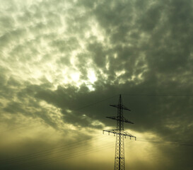 powerlines in front of dramatic sky