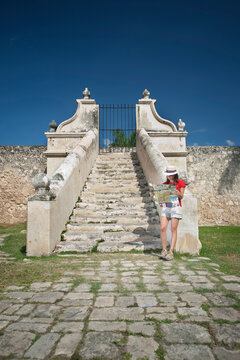 Woman reading a map in Campeche, Mexico.