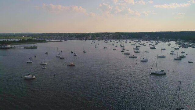 hyper lapses of boats in a harbor filmed with a drone in Massachusetts
