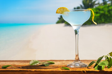 Blue lagoon cocktail on tropical beach bar.