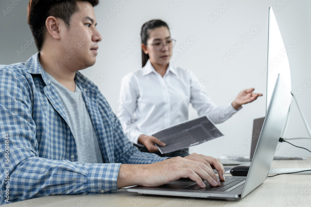 Leinwandbilder Team of two professional programmers working on website projects in software development and making coding and typing data code password security in office