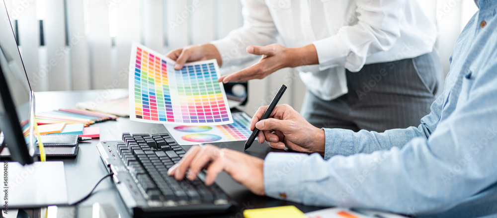 Poster two creative graphic designer team working on color selection an