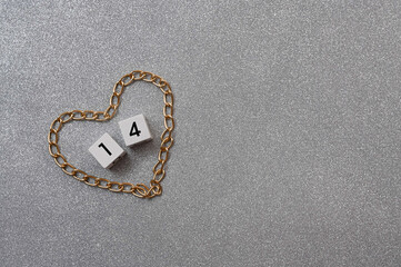 heart from a chain with numbers 14 on a gray background. Valentine's day concept. mock up