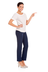 Full-length studio portrait of an attractive young woman  pointing to something in copyspace isolated on a PNG background.