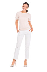 Fototapeta premium An attractive young woman smiling and standing with her hands in her pockets isolated on a PNG background.