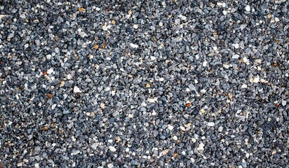 	
texture of gravel stones on ground on ground background	
