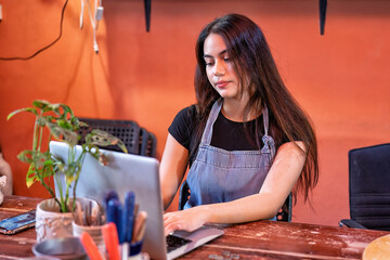 Tired stressed business woman suffering body neck pain from incorrect posture sitting on work
