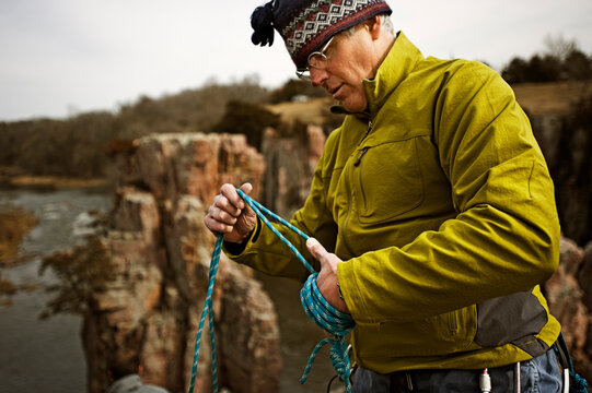 A man packs climbing gear at Palisades State Park, South Dakota.