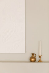 Closeup of white textured canvas on the wall, candlestick, vase on the shelf. Minimalistic concept of home decor. Picture, artwork, poster mockup.