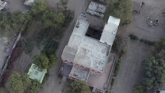 An ancient building with cracks in the roof in the village Kerwada, Bharuch, Gujarat, India