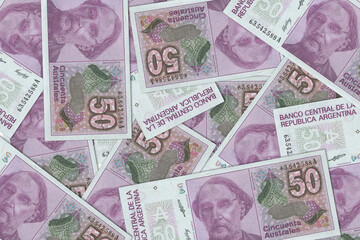 The Argentine currency - Argentine peso. Macro view of Argentina paper money. Close-up Argentine...