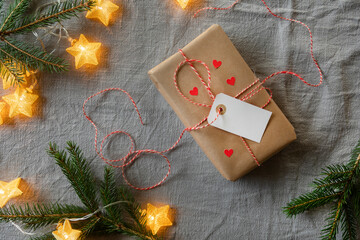Christmas gift and fairy lights - 565015634