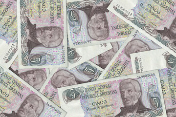 The Argentine currency - Argentine peso. Macro view of Argentina paper money. Close-up Argentine...