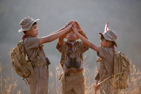 Scouts Hold Hands In Camp, A Strong Idea About Teamwork And Cooperation, Which Also Means Immigration And Friendship.