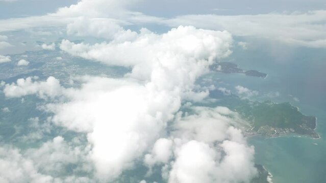 view from inside airplane airasia while flying over cloud on sky