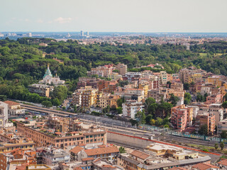 Fototapeta na wymiar Cityscape of Rome and stormy, cloudy sky. Storm is coming. Rainy day in Capital of Italy. Panoramic view.