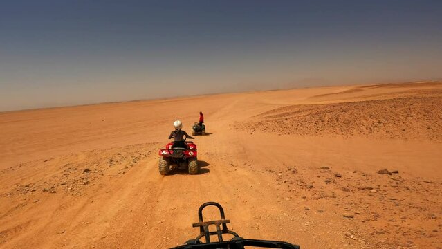 Quad Bikes Driving at Safari Desert in Hurghada, Egypt, Off Road Trip, Sandy Terrain, Horizon View, Extreme Sports