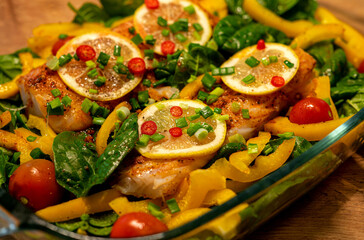 bright baked fish with vegetables