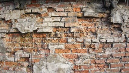 The texture of a crumbling brick wall