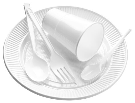 Disposable Plastic dishware. White cup, plate, fork and spoon isolated on transparent background