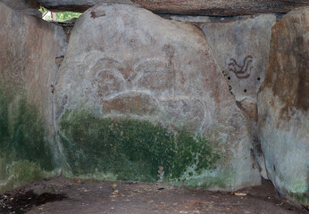 Engravings on stones in the tumulus Mane Lud near Locmariaqur in Brittany, France