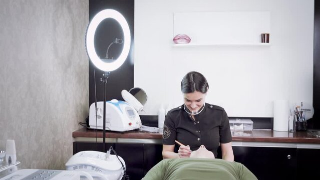 man at the beautician, microcurrent procedure, beauty procedures