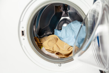 Dirty laundry inside the washing machine....