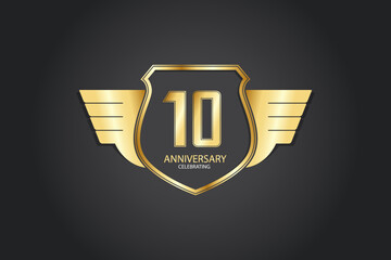 10 years anniversary logotype 3D golden stylized modern shape winged shield on black background