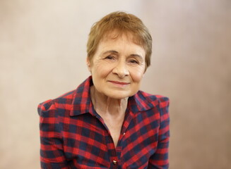 woman headshot in her 70s studio photo