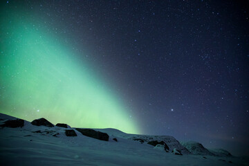 Northern lights in Reinheim Cabin, Dovrefjell National Park, Norway