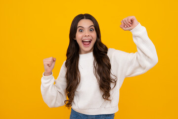 Excited teenager girl. Amazed teen girl. Excited expression, cheerful and glad. Joy, victory,...