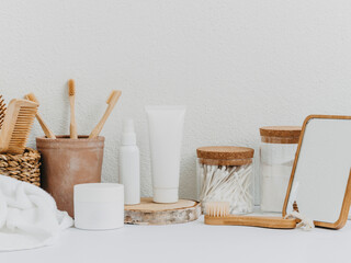 Fototapeta na wymiar Bath background front view with straw box, container with toothbrushes, cosmetics