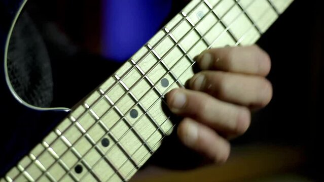 man playing electric guitar with pick making music stock video stock footage