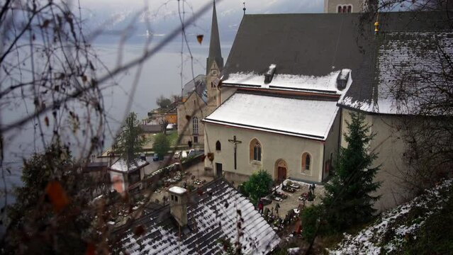 Clip filmed in Europe in Austria from a town called Hallstatt that's by a lake. Filmed in winter time in December of a beautifull town with houses and a church. Filmed in 4k with a smooth movement