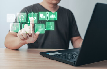 person use software to save energy,and reduce global warming,climate change,ecology friendly investment,ESG environment social governance,Green Business Innovation and Sustainable Development concept.