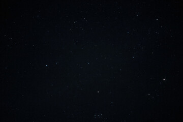Dark night sky with stars background. Space stars texture. Colorful stars in the night sky