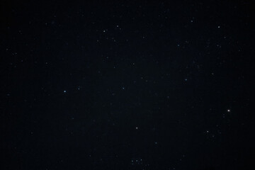 Dark night sky with stars background. Space stars texture. Colorful stars in the night sky